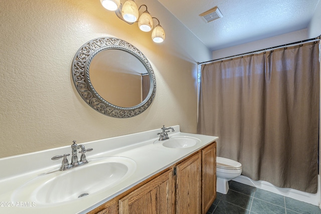 2340 W Myrtle Dr, Chandler, AZ 85248 - full bath with a textured wall, tile patterned floors, and double vanity