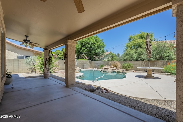2340 W Myrtle Dr, Chandler, AZ 85248 - fenced backyard featuring a ceiling fan and a patio