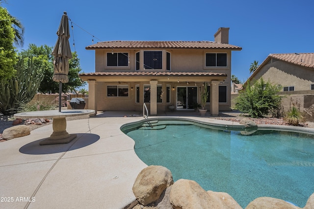 2340 W Myrtle Dr, Chandler, AZ 85248 - back of house with a patio area, a chimney, stucco siding, and a tiled roof