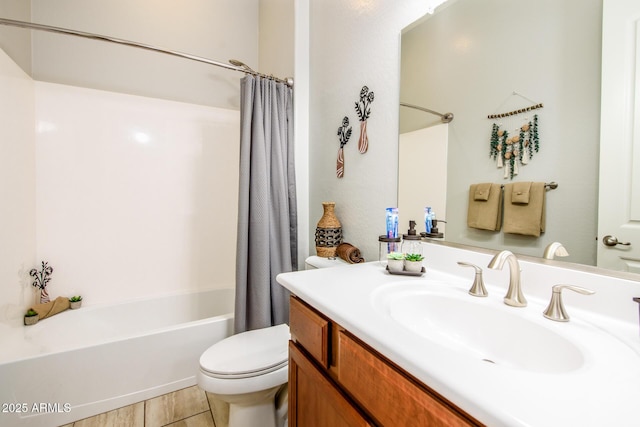 full bathroom featuring shower / tub combo, vanity, and toilet