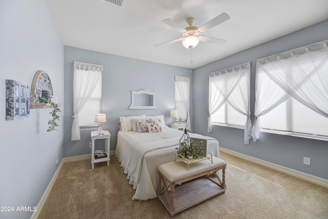 bedroom featuring ceiling fan and carpet floors