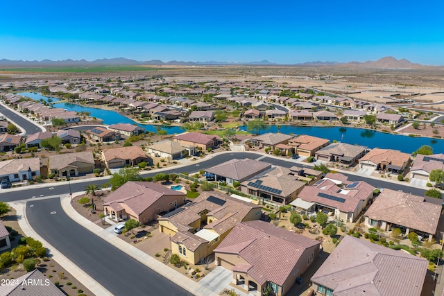 bird's eye view featuring a water and mountain view