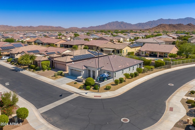 drone / aerial view featuring a mountain view