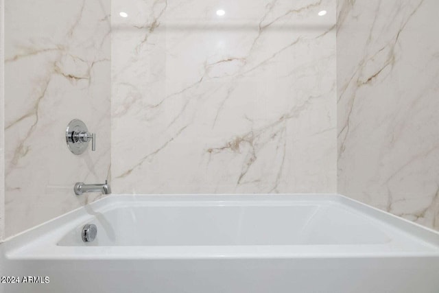 full bath with a bath