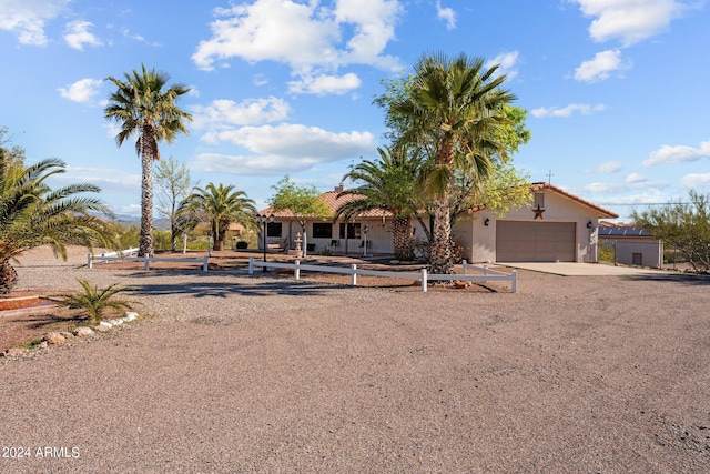 view of front of property with a garage