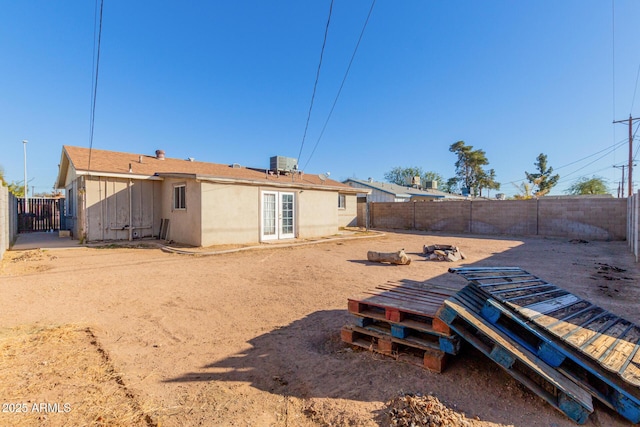 back of property with cooling unit