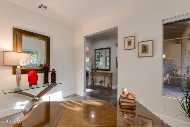 hallway with crown molding