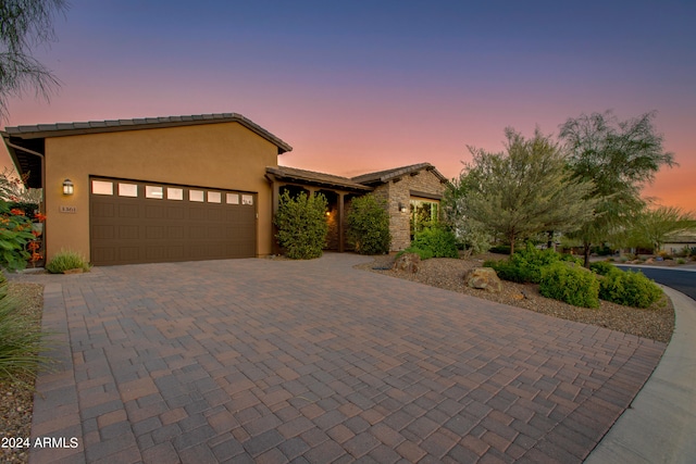 view of front of home with a garage