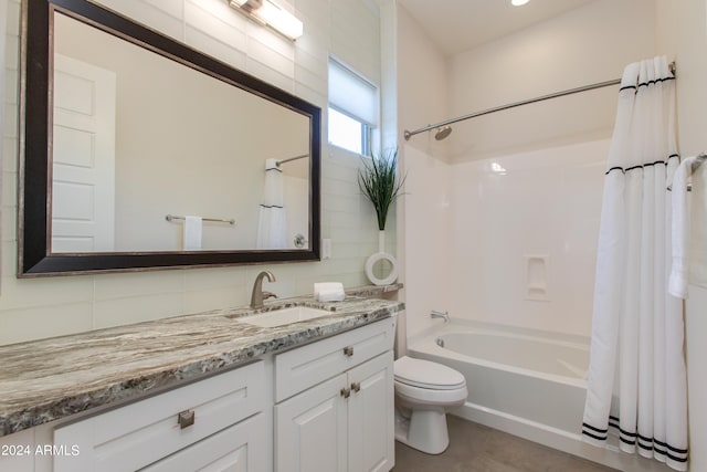 full bathroom with shower / bath combo, decorative backsplash, tile patterned floors, vanity, and toilet