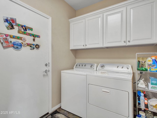 washroom featuring cabinets, tile patterned floors, and independent washer and dryer