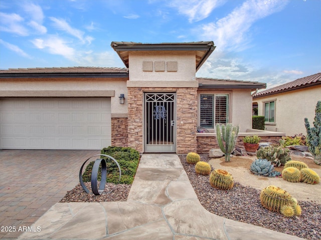 view of front of home with a garage