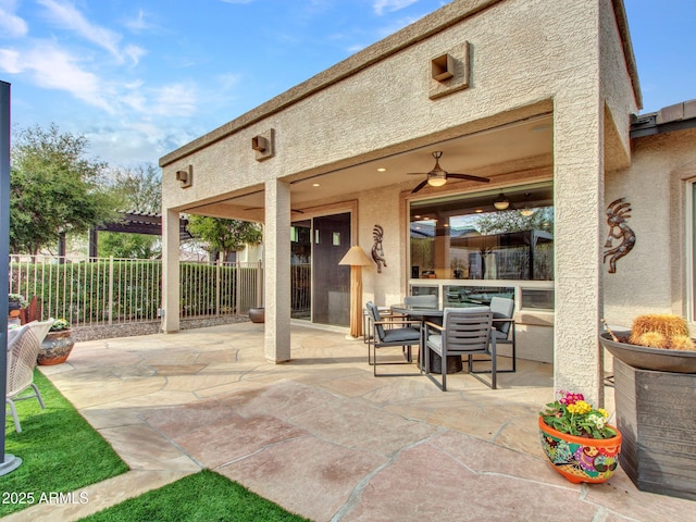 view of patio with ceiling fan