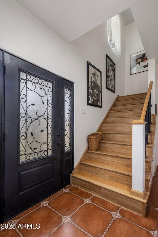 entrance foyer featuring stairway