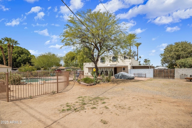 exterior space featuring fence, stucco siding, a patio, and a fenced in pool
