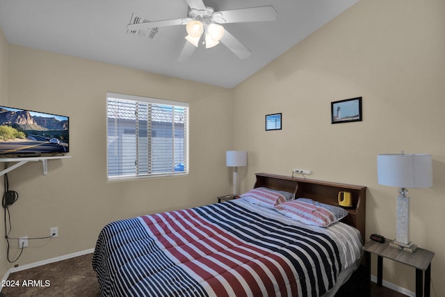 tiled bedroom featuring ceiling fan and vaulted ceiling