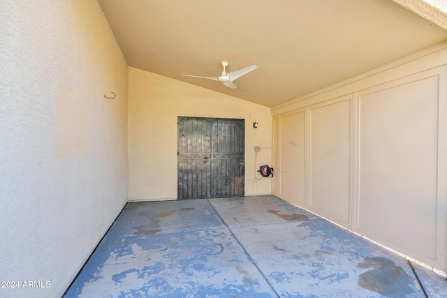 view of exterior entry featuring ceiling fan