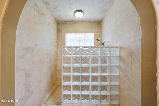 6911 E Thunderbird Rd, Scottsdale, AZ 85254 - staircase featuring tile walls