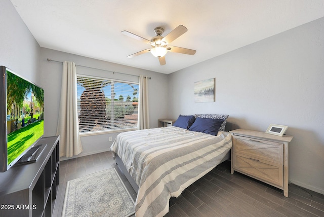 6911 E Thunderbird Rd, Scottsdale, AZ 85254 - bedroom with dark wood-type flooring and ceiling fan