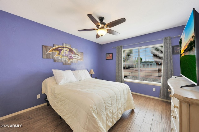 6911 E Thunderbird Rd, Scottsdale, AZ 85254 - bedroom featuring wood finished floors and a ceiling fan