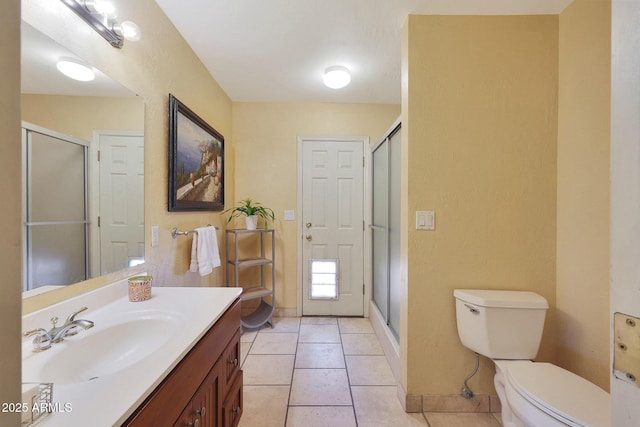 6911 E Thunderbird Rd, Scottsdale, AZ 85254 - full bathroom with vanity, a stall shower, and tile patterned floors