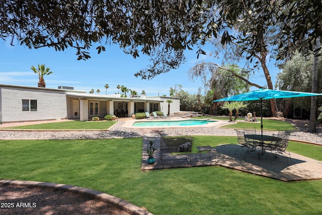 6911 E Thunderbird Rd, Scottsdale, AZ 85254 - outdoor pool featuring a patio area and a lawn