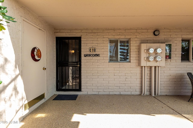 16852 E Ln Montana Dr Unit C18, Fountain Hills, AZ 85268 - doorway to property featuring brick siding