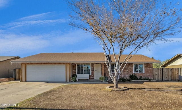 ranch-style home with a garage