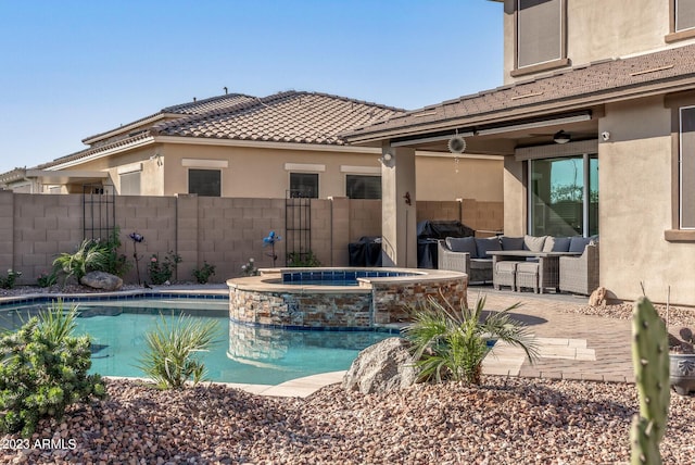 14655 W Pasadena Ave, Litchfield Park, AZ 85340 - view of swimming pool with an outdoor hangout area, a patio area, ceiling fan, a pool with connected hot tub, and fence