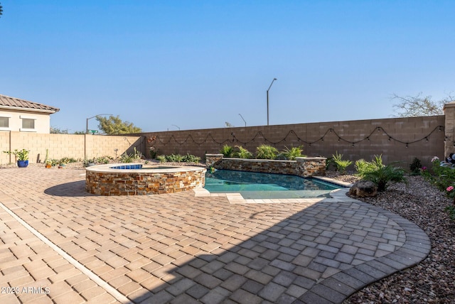 14655 W Pasadena Ave, Litchfield Park, AZ 85340 - view of swimming pool featuring a fenced backyard, a fenced in pool, and a patio