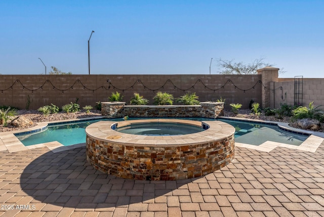 14655 W Pasadena Ave, Litchfield Park, AZ 85340 - view of swimming pool featuring a patio, a fenced backyard, and a fenced in pool