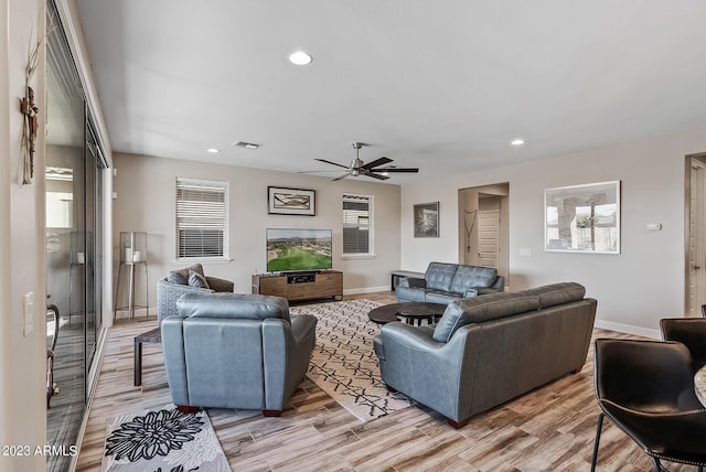14655 W Pasadena Ave, Litchfield Park, AZ 85340 - living room with ceiling fan, light wood-style flooring, visible vents, recessed lighting, and baseboards