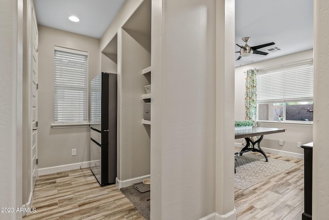14655 W Pasadena Ave, Litchfield Park, AZ 85340 - walk in closet featuring wood finished floors, a ceiling fan, and visible vents