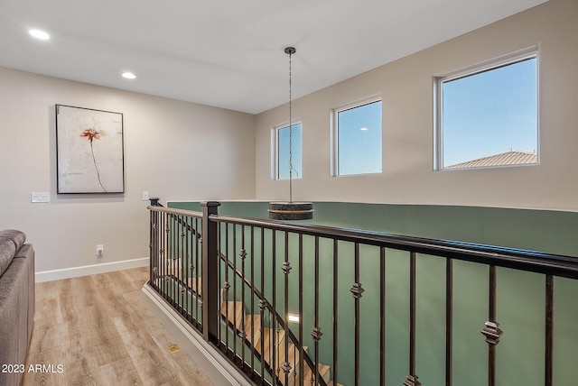 14655 W Pasadena Ave, Litchfield Park, AZ 85340 - hallway featuring recessed lighting, an upstairs landing, wood finished floors, and baseboards