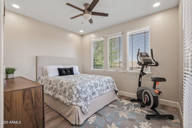 14655 W Pasadena Ave, Litchfield Park, AZ 85340 - bedroom with baseboards, recessed lighting, wood finished floors, and a ceiling fan