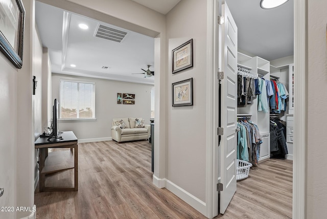 14655 W Pasadena Ave, Litchfield Park, AZ 85340 - hallway featuring wood finished floors, baseboards, and visible vents