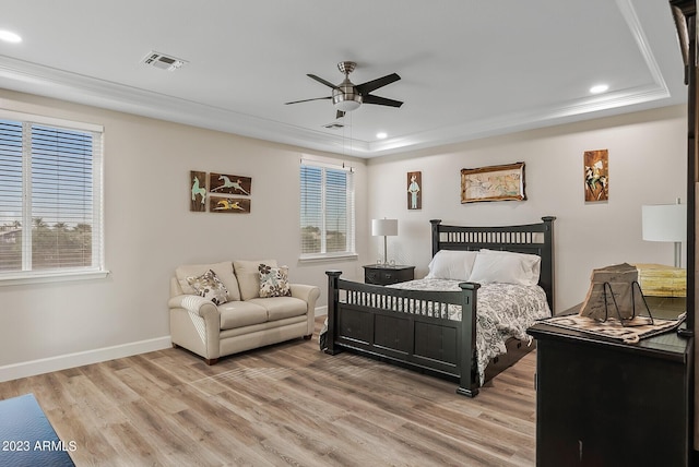 14655 W Pasadena Ave, Litchfield Park, AZ 85340 - bedroom with a raised ceiling, light wood finished floors, and recessed lighting