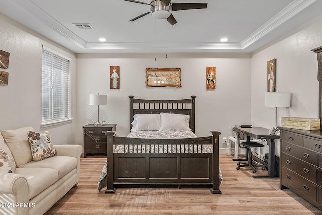 14655 W Pasadena Ave, Litchfield Park, AZ 85340 - bedroom featuring crown molding, a tray ceiling, light wood-style flooring, visible vents, and recessed lighting