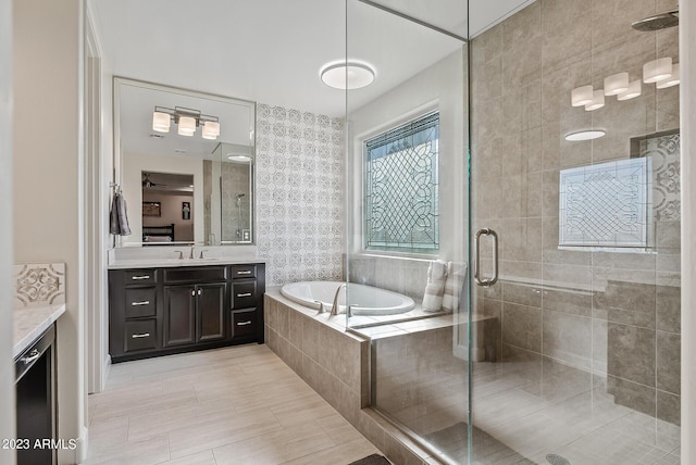 14655 W Pasadena Ave, Litchfield Park, AZ 85340 - full bath featuring a bath, a stall shower, and vanity
