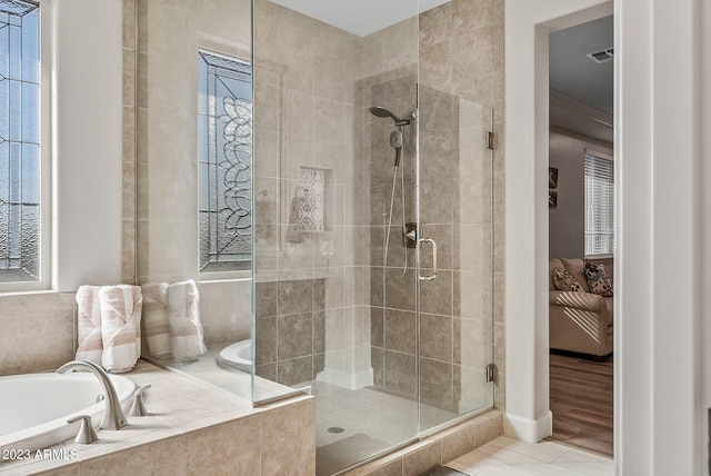 14655 W Pasadena Ave, Litchfield Park, AZ 85340 - full bath featuring a bath, a stall shower, and visible vents