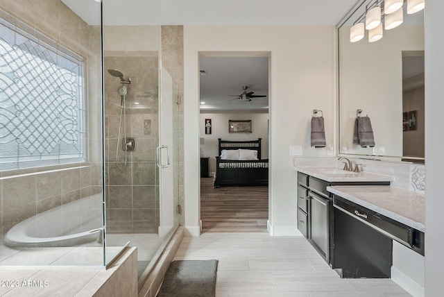 14655 W Pasadena Ave, Litchfield Park, AZ 85340 - bathroom featuring vanity, baseboards, tile patterned floors, a ceiling fan, and a shower stall