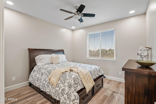 14655 W Pasadena Ave, Litchfield Park, AZ 85340 - bedroom with light wood-style floors, baseboards, and recessed lighting