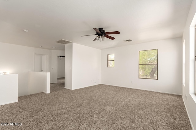 304 E Beth Dr, Phoenix, AZ 85042 - carpeted empty room with a ceiling fan and baseboards