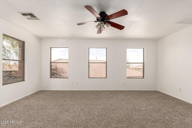 304 E Beth Dr, Phoenix, AZ 85042 - empty room with carpet floors, baseboards, and ceiling fan