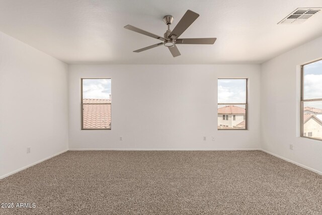 304 E Beth Dr, Phoenix, AZ 85042 - empty room featuring carpet, ceiling fan, and baseboards