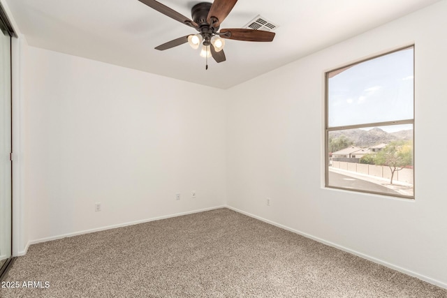 304 E Beth Dr, Phoenix, AZ 85042 - carpeted empty room with ceiling fan and baseboards