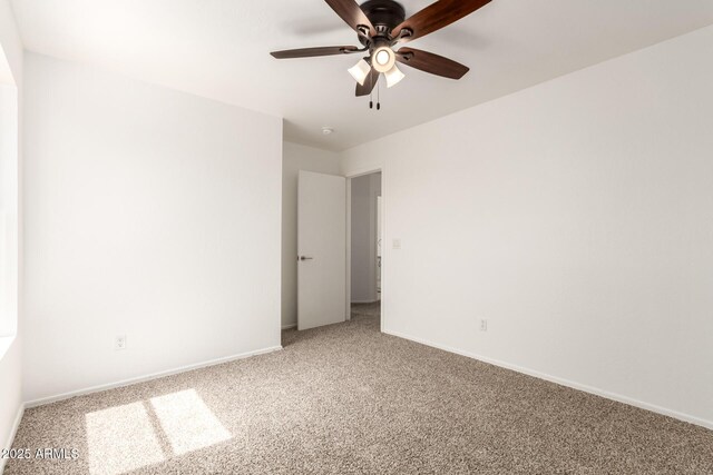 304 E Beth Dr, Phoenix, AZ 85042 - empty room featuring carpet flooring, ceiling fan, and baseboards