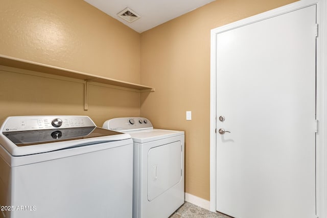 304 E Beth Dr, Phoenix, AZ 85042 - laundry room featuring washer and dryer and baseboards