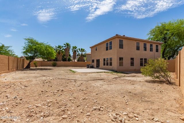 304 E Beth Dr, Phoenix, AZ 85042 - rear view of house featuring a patio area, a fenced backyard, stucco siding, and a tile roof