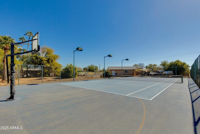 view of sport court featuring basketball court