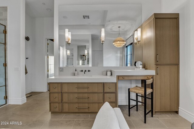 bathroom featuring vanity and tile patterned flooring